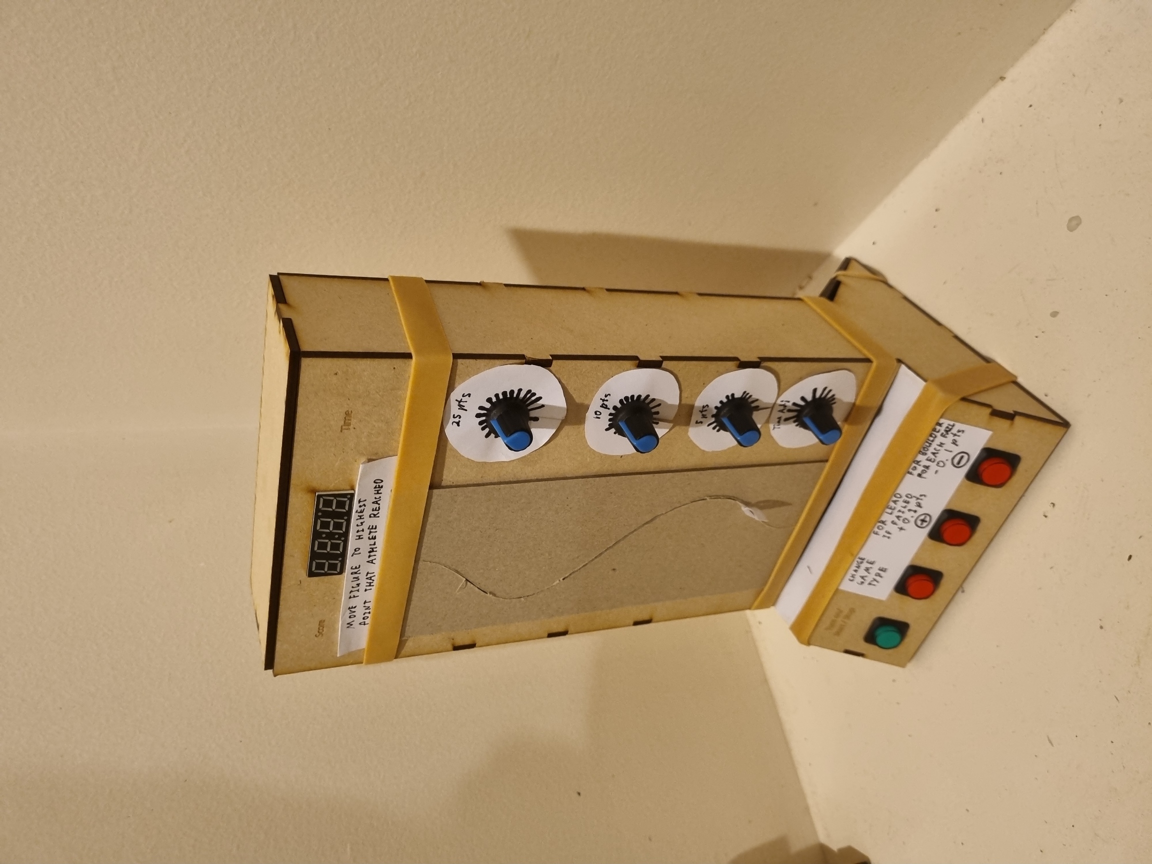 Photo of the B.A.L.S first iteration prototype that looks like a tall rectangular shape and trapezium base with digital parts but is not functional.